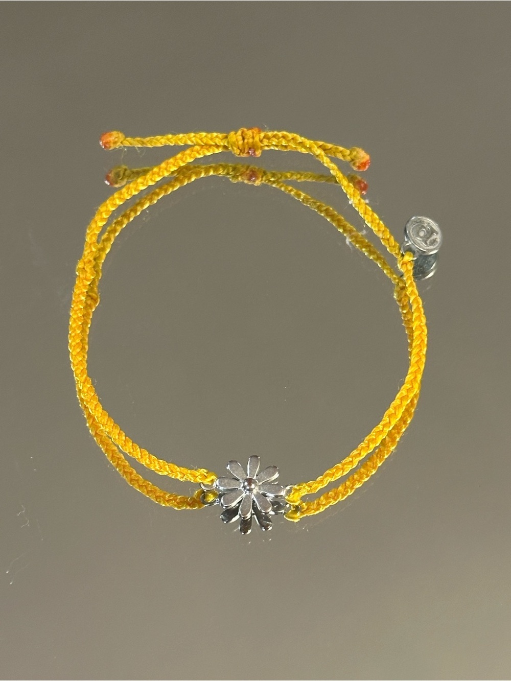 Pura Vida. Yellow Braided Bracelet with Silver Daisy